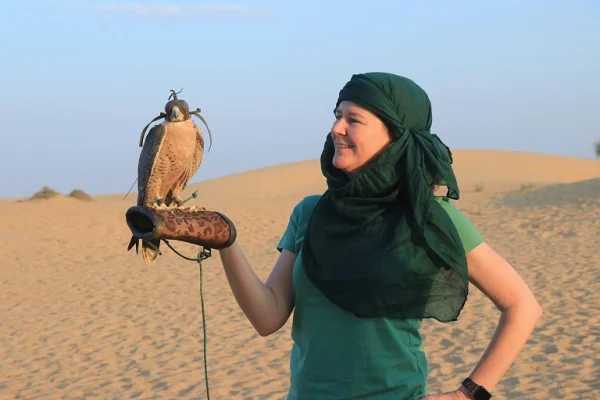 Falconry demonstration during a heritage desert safari